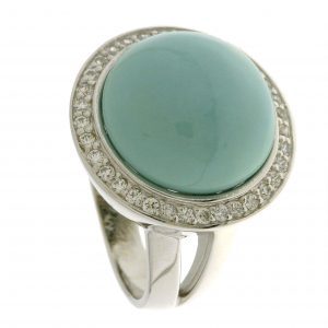 Sortija de plata rodiada, con Terbium Turquesa y Circonitas.